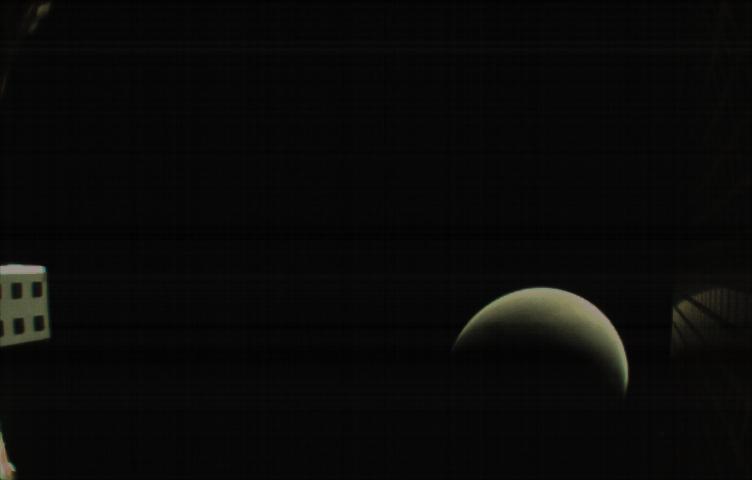 MarCO-B, one of the experimental Mars Cube One (MarCO) CubeSats, took this image of Mars from about 10,900 miles (17,500 kilometers) away just after NASA’s InSight spacecraft landed on Mars on Nov. 26, 2018. MarCO-B flew by Mars with its twin, MarCO-A, to serve as communications relays for InSight as it touched down on the Red Planet around noon PST (3 p.m. EST). This image was taken at 1 p.m. PST (4 p.m. EST).  A crescent Mars with its south pole in the 4 o’clock position is visible in this picture. MarCO-B’s antenna reflector mirrors a portion of the illuminated part of Mars on the bottom right. The antenna feed (white rectangle with gold squares) is visible on the left. This image was taken about 50 minutes after PIA22833 and 10 seconds after PIA22832.  The MarCO and InSight projects are managed for NASA's Science Mission Directorate, Washington, by JPL, a division of Caltech, Pasadena.   Credit: NASA/JPL-Caltech